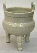 China%2C%20Fujian%20province%2C%20Dehua%20kilns%2C%20%3Cb%3E%3Ci%3E%20Incense%20burner%20in%20the%20shape%20of%20an%20archaic%20tripod%3C%2Fi%3E%3C%2Fb%3E%2C%2019th%20century%2C%20porcelain%20with%20clear%20glaze%3B%20stamped%20character%20for%20shou%20%28longevity%29%20in%20a%20repeating%20band%20around%20waist%3B%20lion%27s%20head-and-paw%20feet%2C%20Gift%20of%20an%20Anonymous%20Donor%2C%20public%20domain%2C%202002.67.3